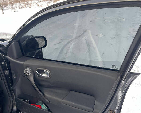 Чорний Рено Меган, об'ємом двигуна 1.46 л та пробігом 325 тис. км за 5300 $, фото 11 на Automoto.ua