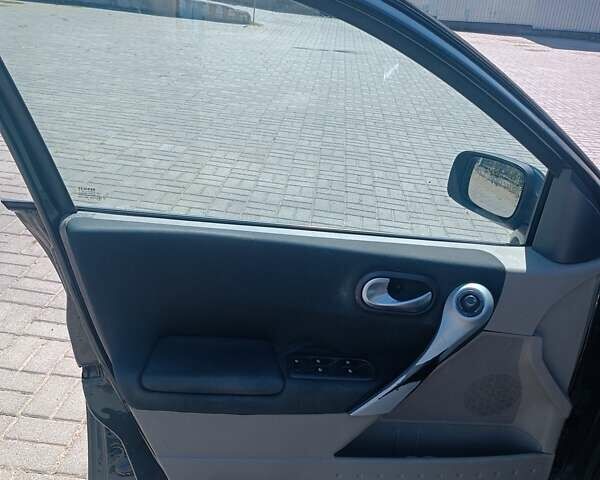 Рено Меган 2004 в Черновцах на Automoto.ua Черный Рено Меган, объемом двигателя 1.46 л и пробегом 407 тыс. км за 4300 $, фото 14 на Automoto.ua