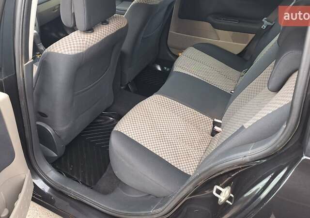 Черный Рено Меган, объемом двигателя 1.6 л и пробегом 230 тыс. км за 4950 $, фото 24 на Automoto.ua