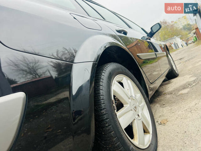 Чорний Рено Меган, об'ємом двигуна 1.6 л та пробігом 208 тис. км за 4850 $, фото 13 на Automoto.ua