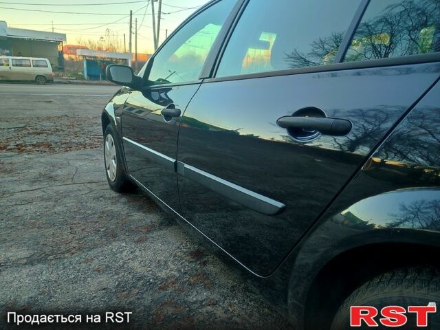 Черный Рено Меган, объемом двигателя 1.4 л и пробегом 216 тыс. км за 5000 $, фото 4 на Automoto.ua