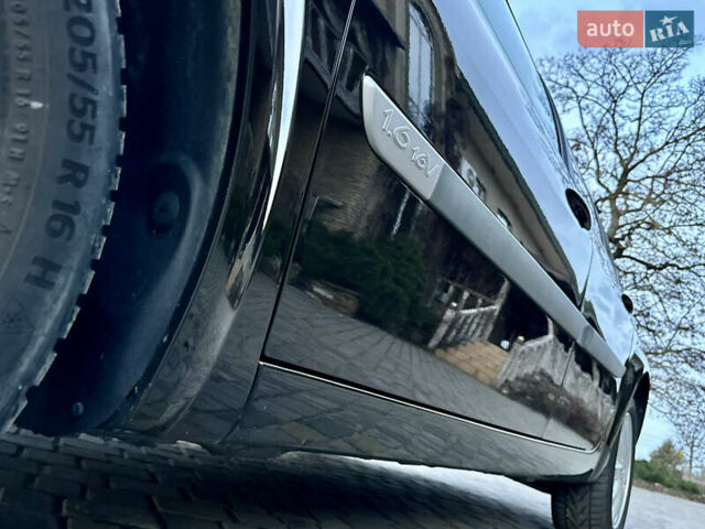 Черный Рено Меган, объемом двигателя 1.6 л и пробегом 68 тыс. км за 6899 $, фото 36 на Automoto.ua