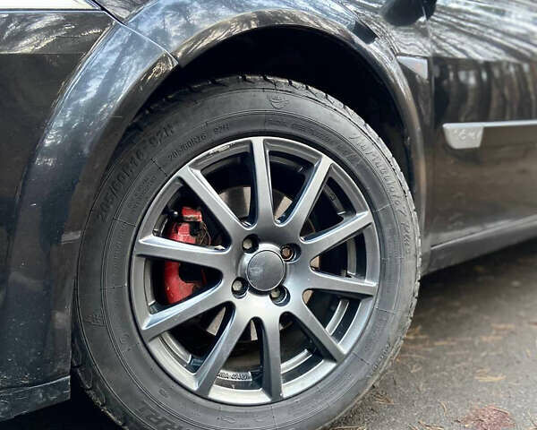 Черный Рено Меган, объемом двигателя 1.6 л и пробегом 326 тыс. км за 4900 $, фото 23 на Automoto.ua