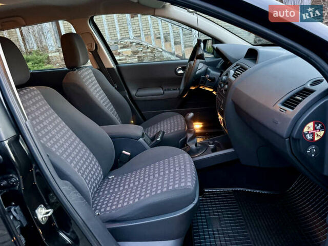 Черный Рено Меган, объемом двигателя 1.6 л и пробегом 68 тыс. км за 6899 $, фото 26 на Automoto.ua