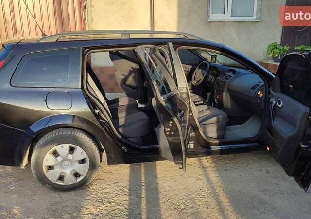 Черный Рено Меган, объемом двигателя 1.6 л и пробегом 198 тыс. км за 5400 $, фото 4 на Automoto.ua