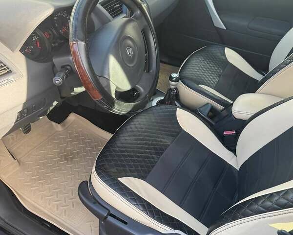 Черный Рено Меган, объемом двигателя 1.6 л и пробегом 348 тыс. км за 4700 $, фото 7 на Automoto.ua