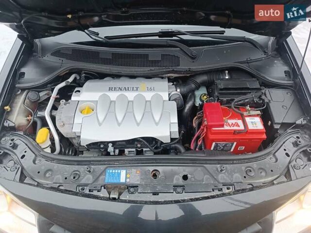Черный Рено Меган, объемом двигателя 1.6 л и пробегом 240 тыс. км за 4999 $, фото 24 на Automoto.ua