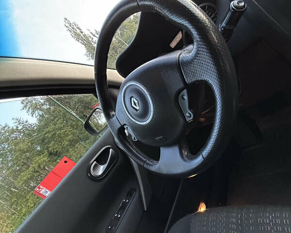 Черный Рено Меган, объемом двигателя 1.6 л и пробегом 209 тыс. км за 5699 $, фото 24 на Automoto.ua