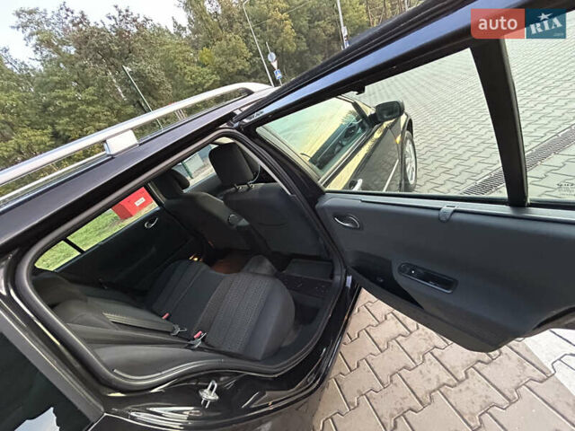 Черный Рено Меган, объемом двигателя 1.6 л и пробегом 209 тыс. км за 5699 $, фото 21 на Automoto.ua