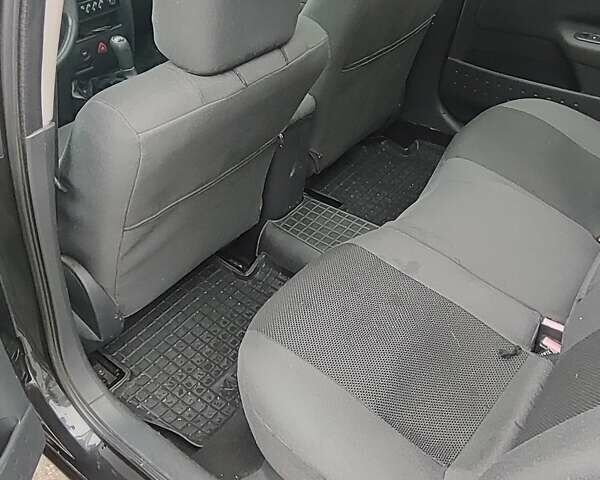 Черный Рено Меган, объемом двигателя 1.6 л и пробегом 258 тыс. км за 4900 $, фото 7 на Automoto.ua