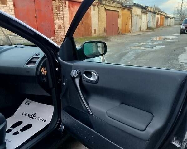 Чорний Рено Меган, об'ємом двигуна 1.6 л та пробігом 185 тис. км за 6199 $, фото 102 на Automoto.ua