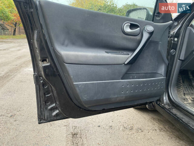 Черный Рено Меган, объемом двигателя 1.46 л и пробегом 243 тыс. км за 5000 $, фото 7 на Automoto.ua