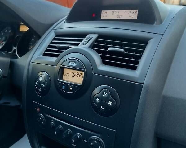 Чорний Рено Меган, об'ємом двигуна 1.6 л та пробігом 185 тис. км за 6199 $, фото 114 на Automoto.ua