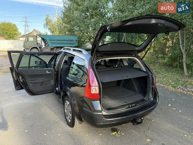 Черный Рено Меган, объемом двигателя 1.6 л и пробегом 225 тыс. км за 6400 $, фото 102 на Automoto.ua