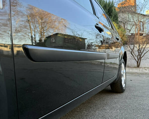 Черный Рено Меган, объемом двигателя 1.6 л и пробегом 200 тыс. км за 6200 $, фото 41 на Automoto.ua