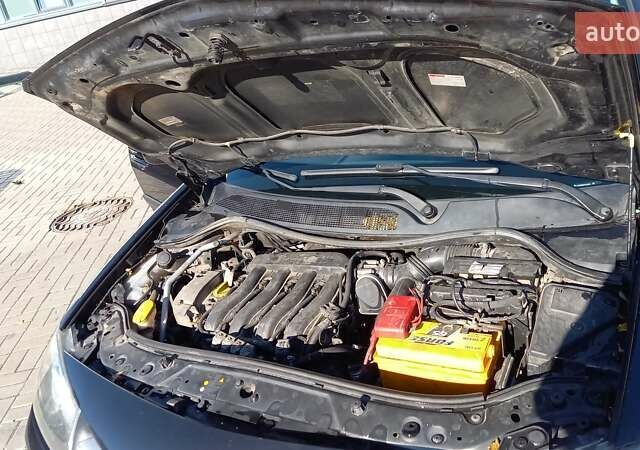 Черный Рено Меган, объемом двигателя 1.6 л и пробегом 206 тыс. км за 5999 $, фото 11 на Automoto.ua