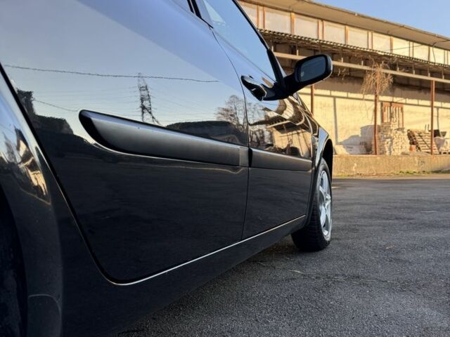 Черный Рено Меган, объемом двигателя 1.6 л и пробегом 200 тыс. км за 6200 $, фото 8 на Automoto.ua