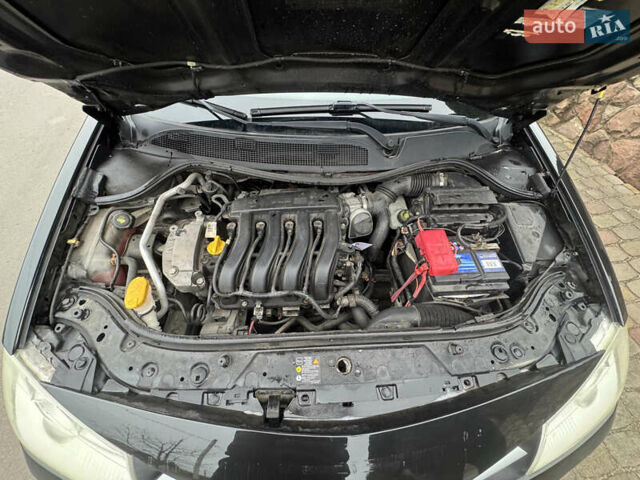 Черный Рено Меган, объемом двигателя 1.6 л и пробегом 190 тыс. км за 5300 $, фото 78 на Automoto.ua