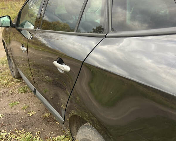 Рено Меган 2009 в Ровно на Automoto.ua Черный Рено Меган, объемом двигателя 1.9 л и пробегом 230 тыс. км за 6500 $, фото 5 на Automoto.ua