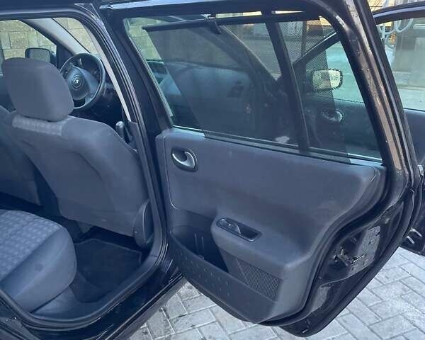 Черный Рено Меган, объемом двигателя 1.6 л и пробегом 257 тыс. км за 5100 $, фото 6 на Automoto.ua