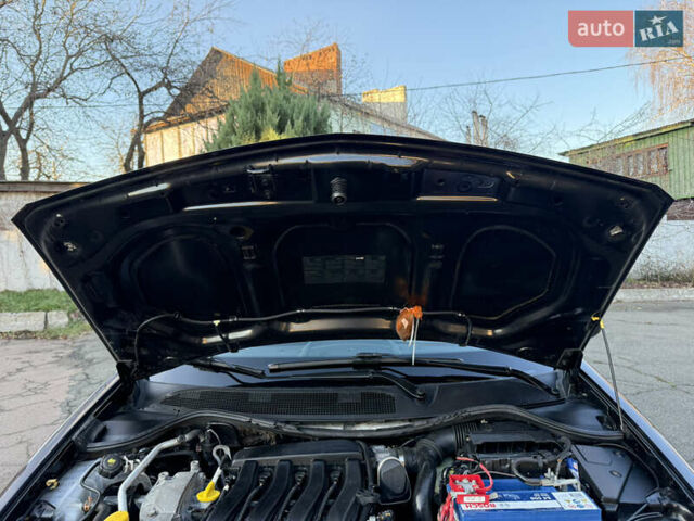 Черный Рено Меган, объемом двигателя 1.6 л и пробегом 200 тыс. км за 6200 $, фото 98 на Automoto.ua