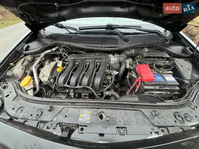 Черный Рено Меган, объемом двигателя 1.6 л и пробегом 190 тыс. км за 5300 $, фото 79 на Automoto.ua