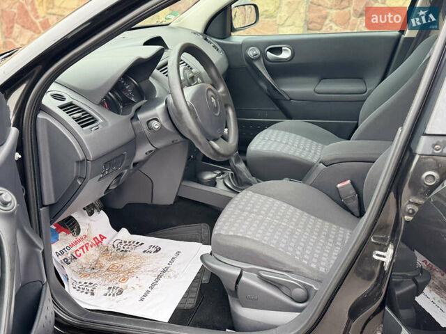 Черный Рено Меган, объемом двигателя 1.6 л и пробегом 190 тыс. км за 5300 $, фото 65 на Automoto.ua