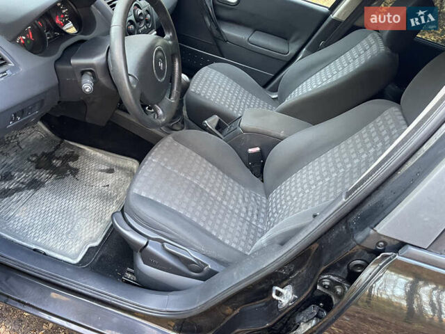 Черный Рено Меган, объемом двигателя 1.6 л и пробегом 219 тыс. км за 4599 $, фото 15 на Automoto.ua