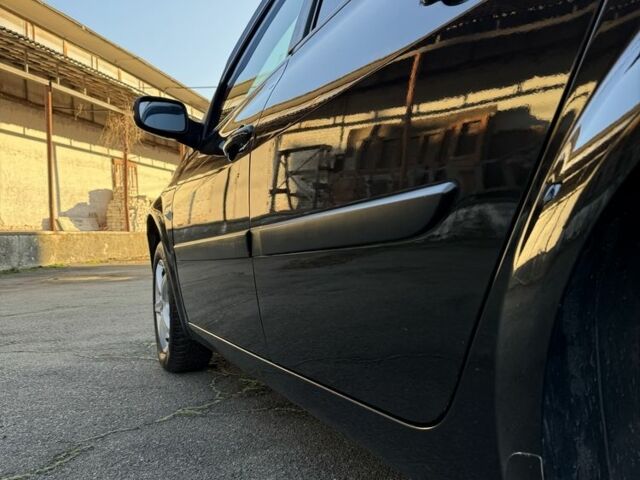 Черный Рено Меган, объемом двигателя 1.6 л и пробегом 200 тыс. км за 6200 $, фото 9 на Automoto.ua