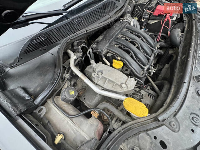 Черный Рено Меган, объемом двигателя 1.6 л и пробегом 190 тыс. км за 5300 $, фото 80 на Automoto.ua