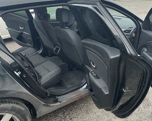 Черный Рено Меган, объемом двигателя 1.5 л и пробегом 330 тыс. км за 8000 $, фото 5 на Automoto.ua