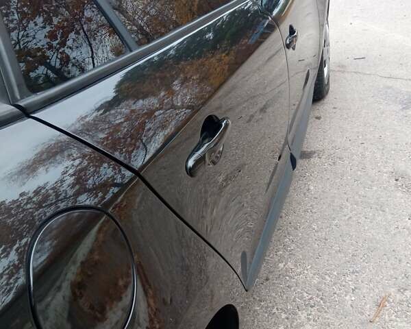 Рено Меган 2010 в Луцке на Automoto.ua Черный Рено Меган, объемом двигателя 1.6 л и пробегом 198 тыс. км за 6100 $, фото 13 на Automoto.ua