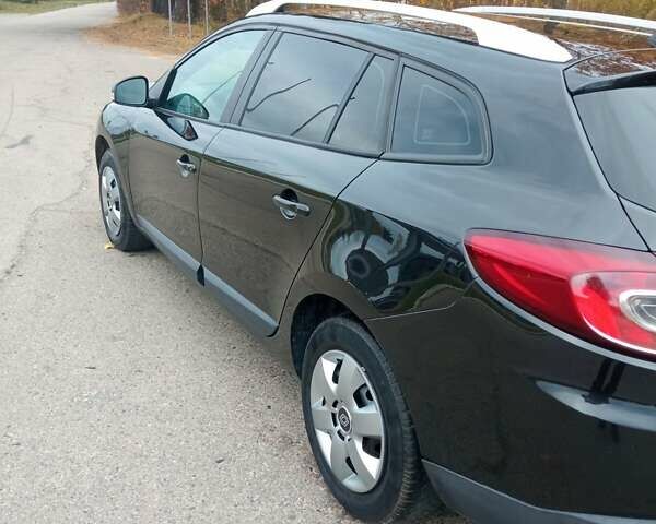 Рено Меган 2010 в Луцке на Automoto.ua Черный Рено Меган, объемом двигателя 1.6 л и пробегом 198 тыс. км за 6100 $, фото 17 на Automoto.ua