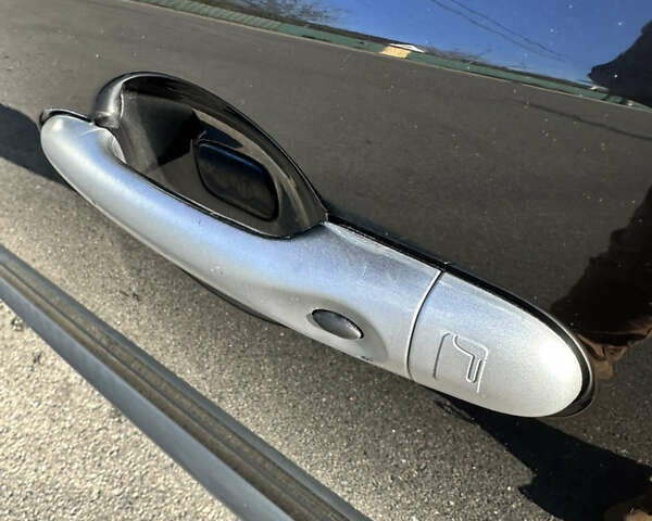 Чорний Рено Меган, об'ємом двигуна 1.46 л та пробігом 243 тис. км за 7600 $, фото 9 на Automoto.ua