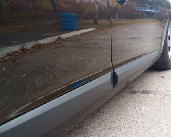 Рено Меган 2010 в Луцке на Automoto.ua Черный Рено Меган, объемом двигателя 1.6 л и пробегом 198 тыс. км за 6100 $, фото 11 на Automoto.ua