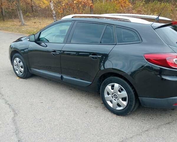 Рено Меган 2010 в Луцке на Automoto.ua Черный Рено Меган, объемом двигателя 1.6 л и пробегом 198 тыс. км за 6100 $, фото 18 на Automoto.ua