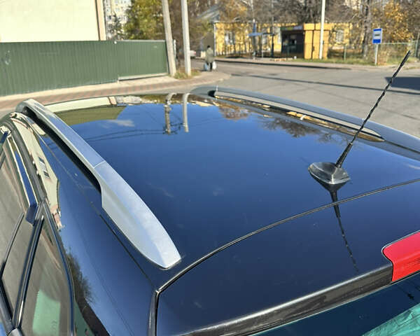 Чорний Рено Меган, об'ємом двигуна 1.46 л та пробігом 243 тис. км за 7600 $, фото 6 на Automoto.ua