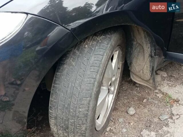 Чорний Рено Меган, об'ємом двигуна 1.46 л та пробігом 325 тис. км за 7700 $, фото 11 на Automoto.ua