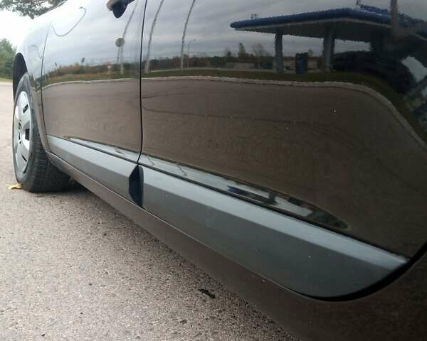 Рено Меган 2010 в Луцке на Automoto.ua Черный Рено Меган, объемом двигателя 1.6 л и пробегом 198 тыс. км за 6100 $, фото 15 на Automoto.ua