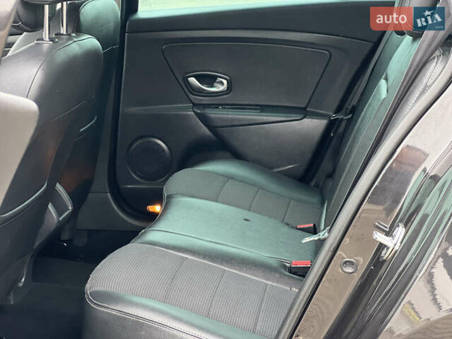 Черный Рено Меган, объемом двигателя 1.4 л и пробегом 170 тыс. км за 6900 $, фото 42 на Automoto.ua