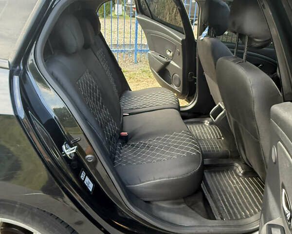 Черный Рено Меган, объемом двигателя 1.46 л и пробегом 276 тыс. км за 5999 $, фото 36 на Automoto.ua