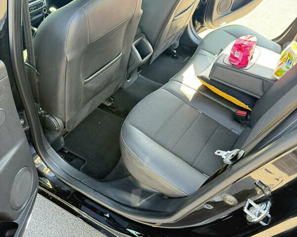 Рено Меган 2012 у Шепетовке на Automoto.ua Чорний Рено Меган, об'ємом двигуна 1.46 л та пробігом 305 тис. км за 8100 $, фото 11 на Automoto.ua