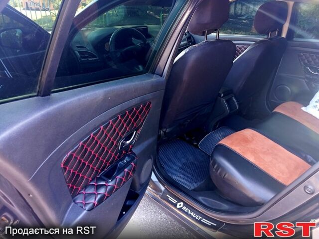 Черный Рено Меган, объемом двигателя 1.5 л и пробегом 249 тыс. км за 7200 $, фото 2 на Automoto.ua