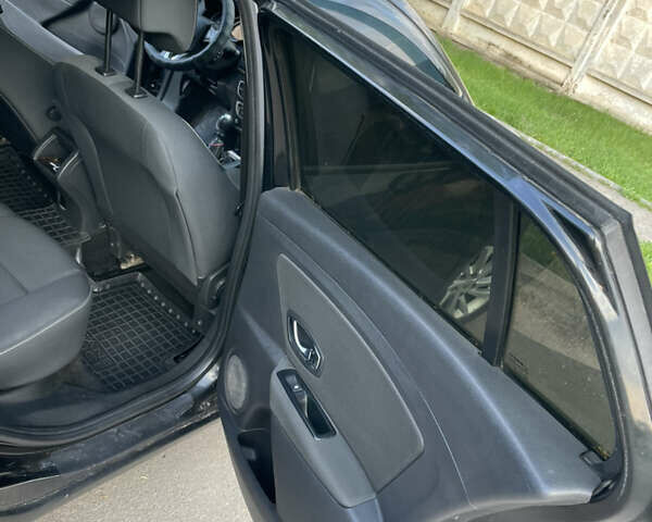 Черный Рено Меган, объемом двигателя 1.5 л и пробегом 300 тыс. км за 7400 $, фото 17 на Automoto.ua