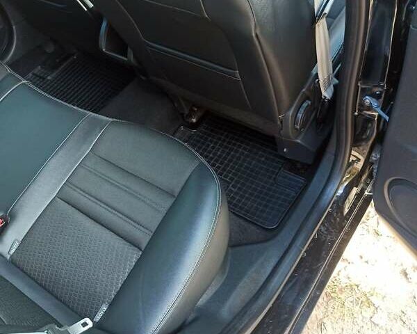 Черный Рено Меган, объемом двигателя 1.2 л и пробегом 242 тыс. км за 9000 $, фото 16 на Automoto.ua