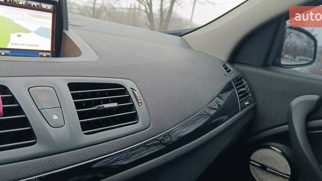Черный Рено Меган, объемом двигателя 1.6 л и пробегом 187 тыс. км за 12300 $, фото 1 на Automoto.ua