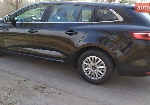 Черный Рено Меган, объемом двигателя 1.39 л и пробегом 142 тыс. км за 12650 $, фото 11 на Automoto.ua