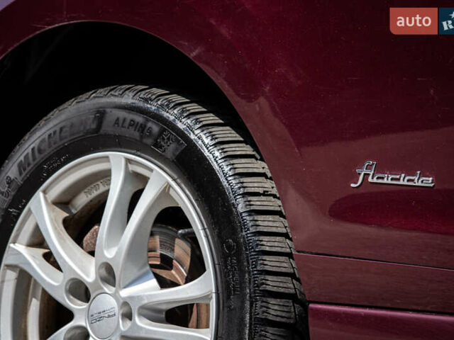 Рено Меган 2012 в Львове на Automoto.ua Фиолетовый Рено Меган, объемом двигателя 0 л и пробегом 167 тыс. км за 9000 $, фото 10 на Automoto.ua