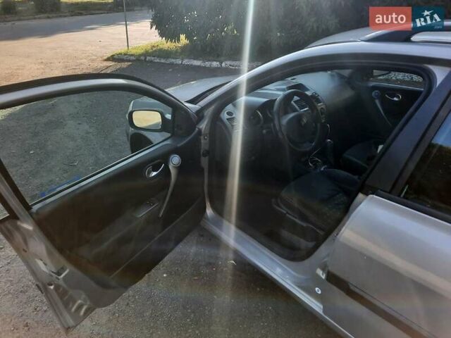 Коричневий Рено Меган, об'ємом двигуна 1.6 л та пробігом 242 тис. км за 4500 $, фото 10 на Automoto.ua