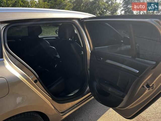 Коричневий Рено Меган, об'ємом двигуна 1.46 л та пробігом 214 тис. км за 15000 $, фото 21 на Automoto.ua